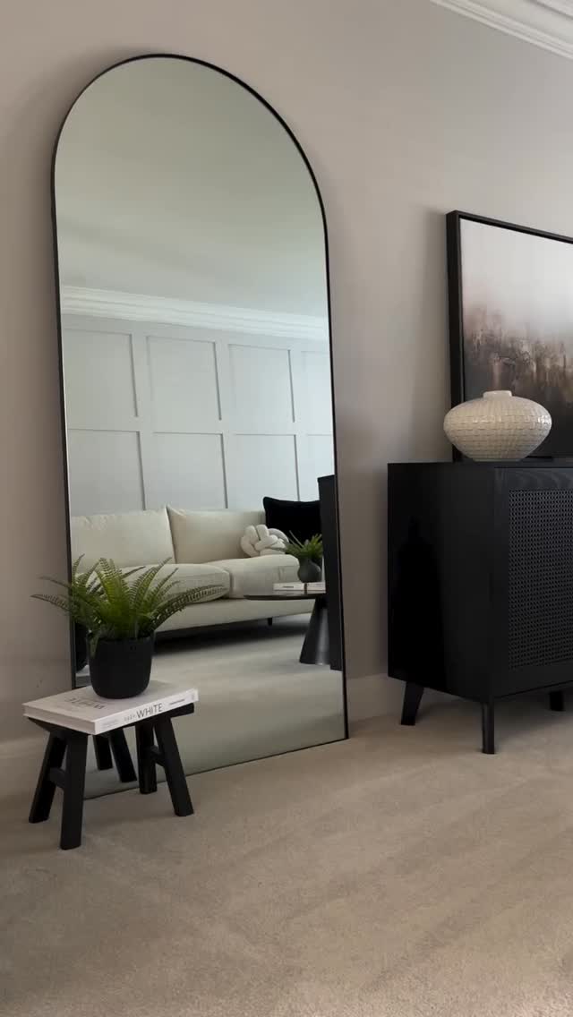 arched mirror living room